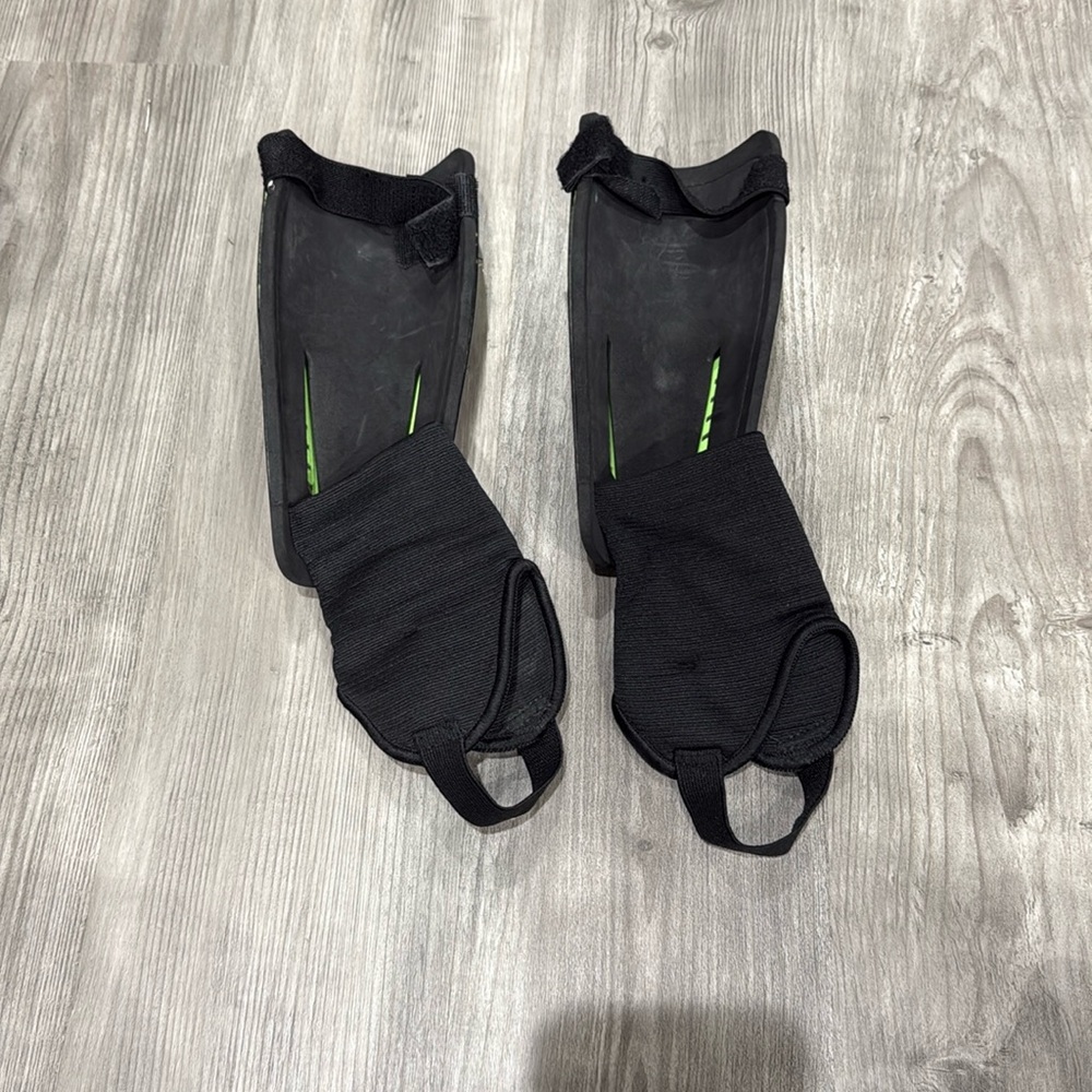 Under Armour Green and Black Shin Guards